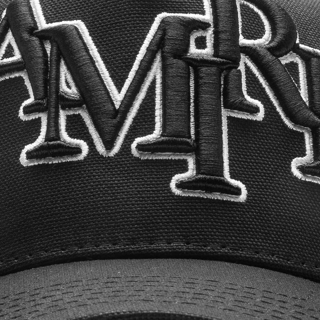 Staggered Logo Trucker Hat Black Alabaster